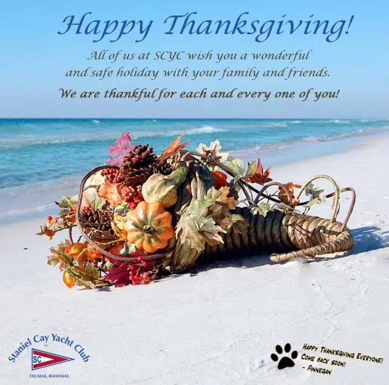 A happy thanksgiving card with a bouquet of flowers on the beach in the Bahamas.