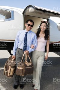 Flying to Abaco Bahamas Couple getting of a charter flight