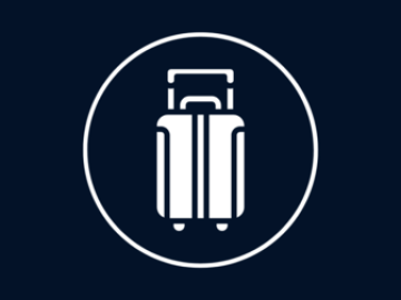 White suitcase icon in a circle on a dark background.